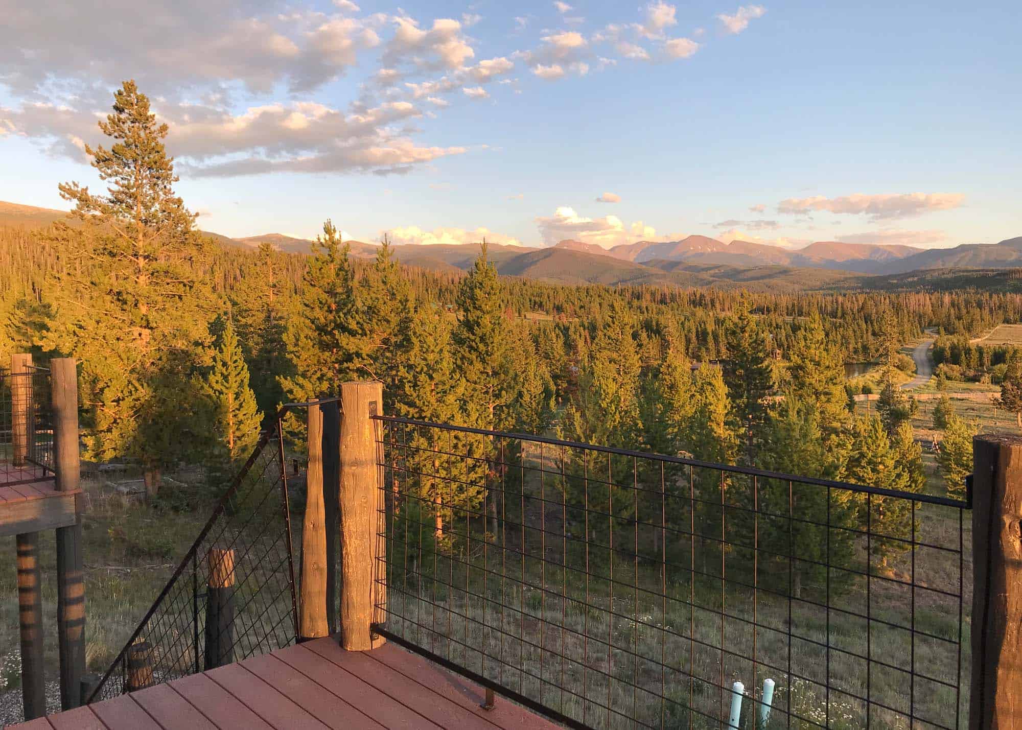 Scenic view from Devil's Thumb Ranch Resort & Spa overlooking lush forests and distant mountains at.