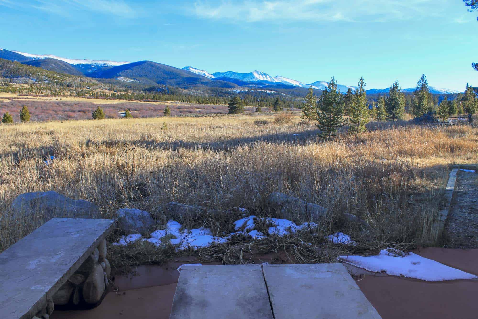 Panoramic view of mountains and open fields at Devil's Thumb Ranch Resort & Spa.