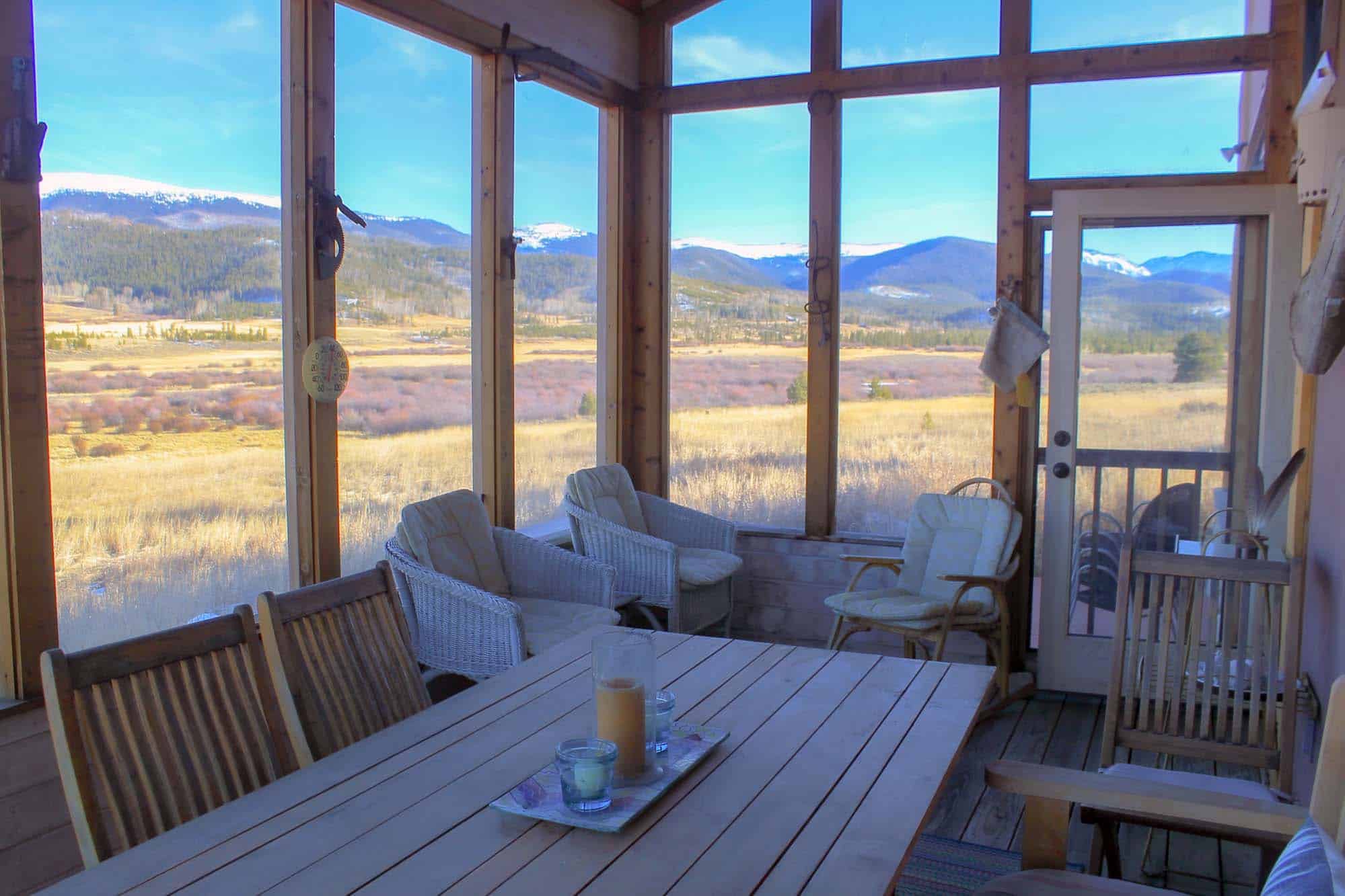Sunroom overlooking mountains at Devil's Thumb Ranch Resort & Spa.