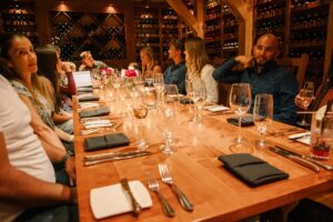 Guests enjoying wine tasting at Devil's Thumb Ranch Resort & Spa.