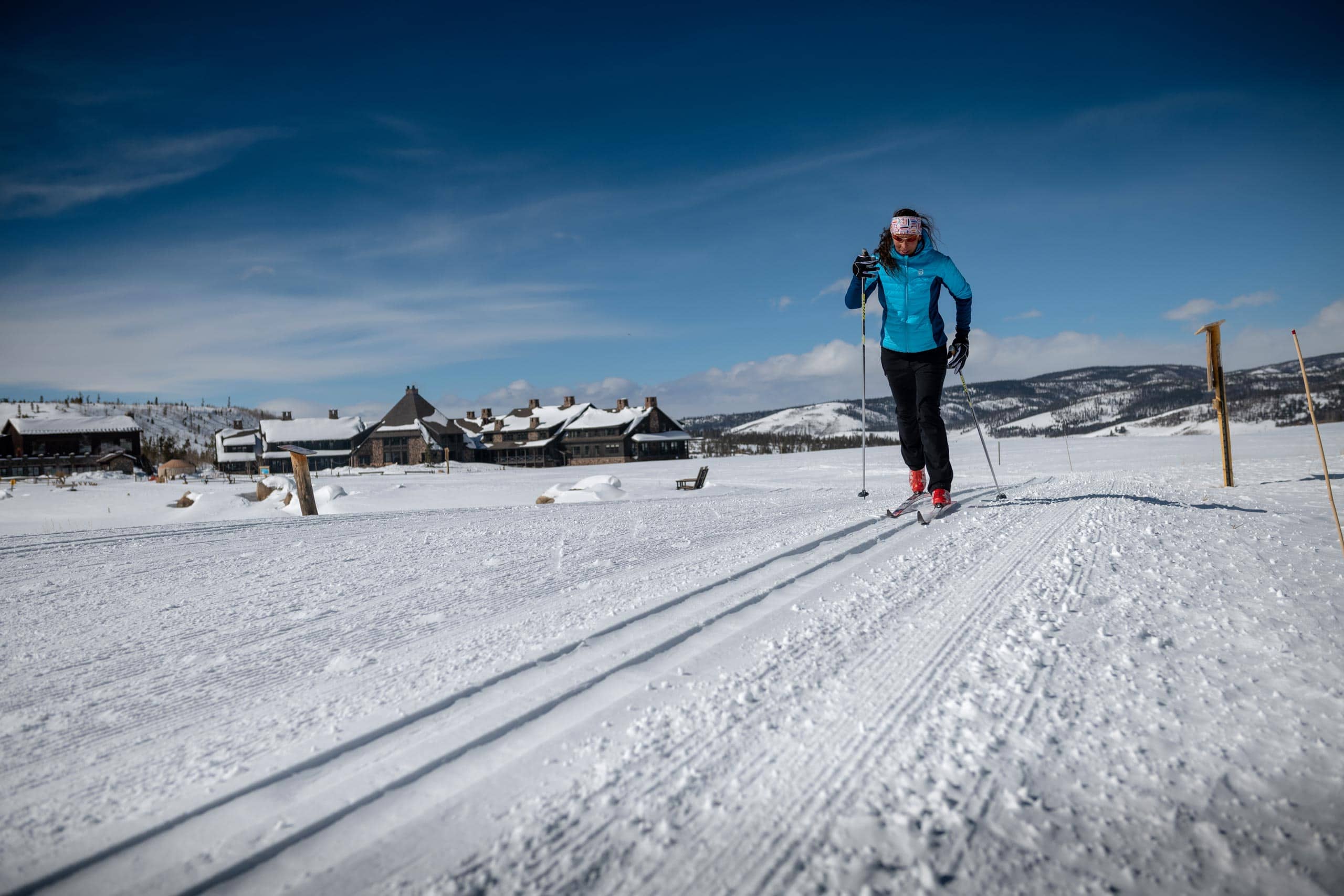Skier on snowy trail at Devil's Thumb Ranch Resort & Spa.