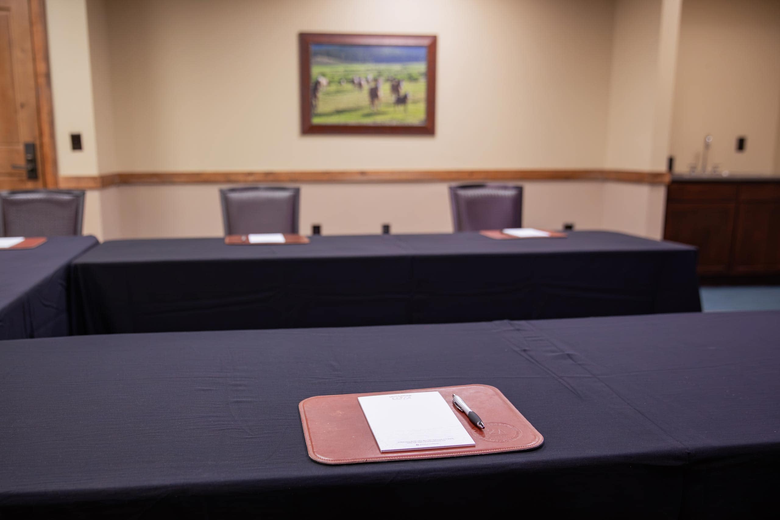 Conference room at Devil's Thumb Ranch Resort & Spa with notepad and pen.
